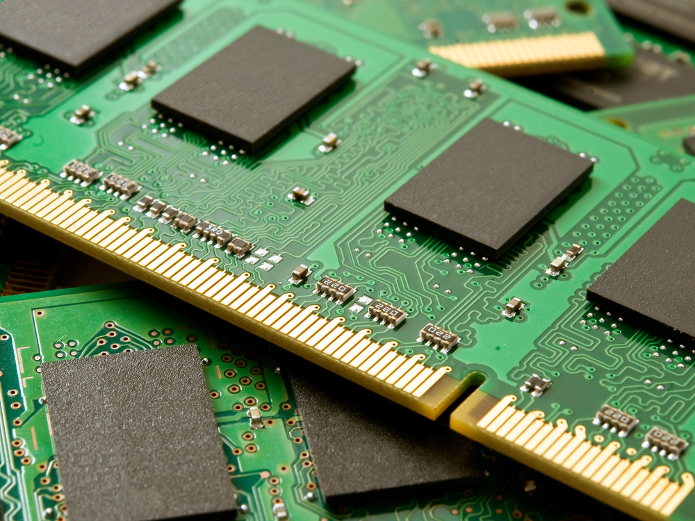DRAM memory modules and chips on a green circuit board